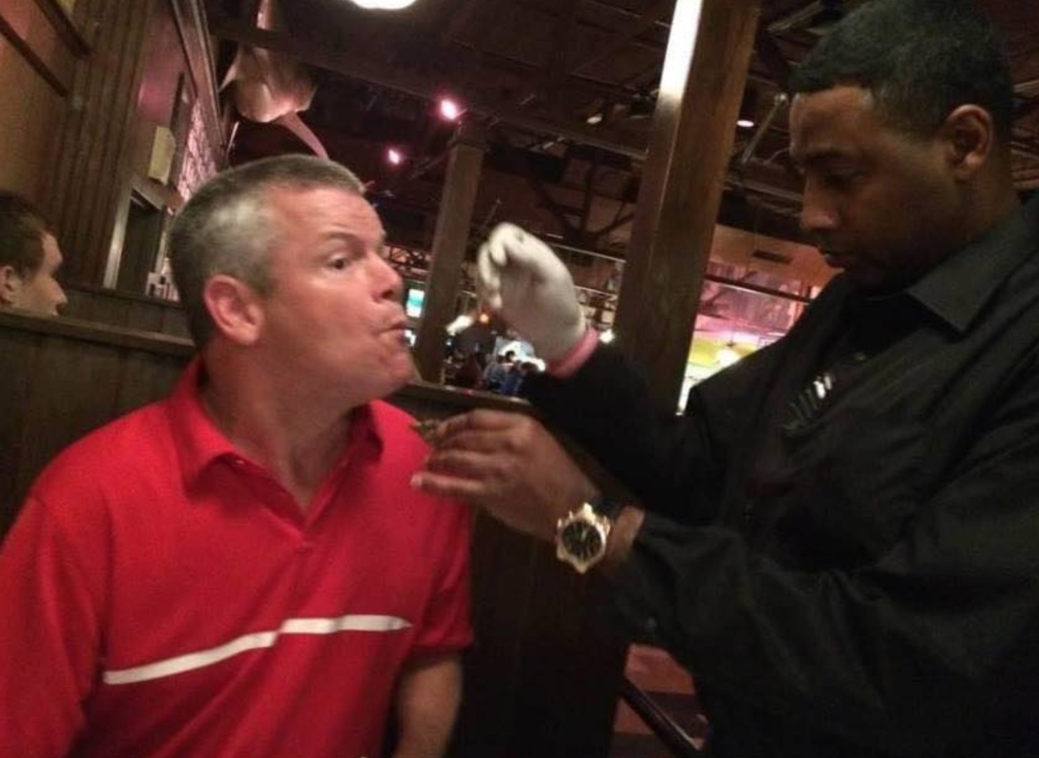 Waiter Feeds Customer with Cerebral Palsy